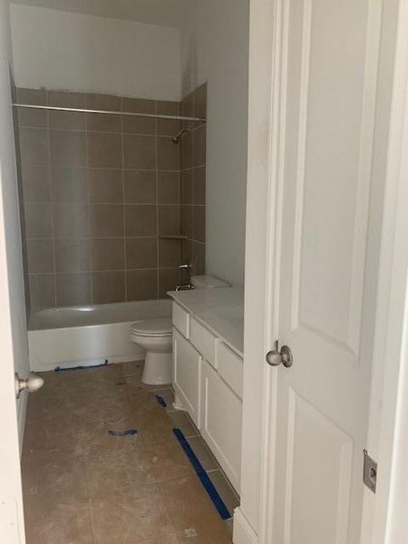 In-progress construction of a new home in Dunham Pointe, Cypress, TX (Image 24).