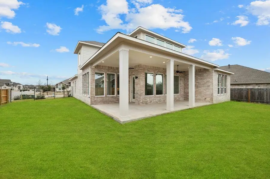 Exterior details and patio area of a home in Santa Rita Ranch, Liberty Hill (Image 4).