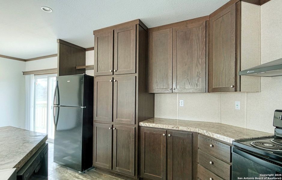 Furnished interior view inside a new home in , Leming (Image 3). Furnished interior view inside a new home in , Leming (Image 3).