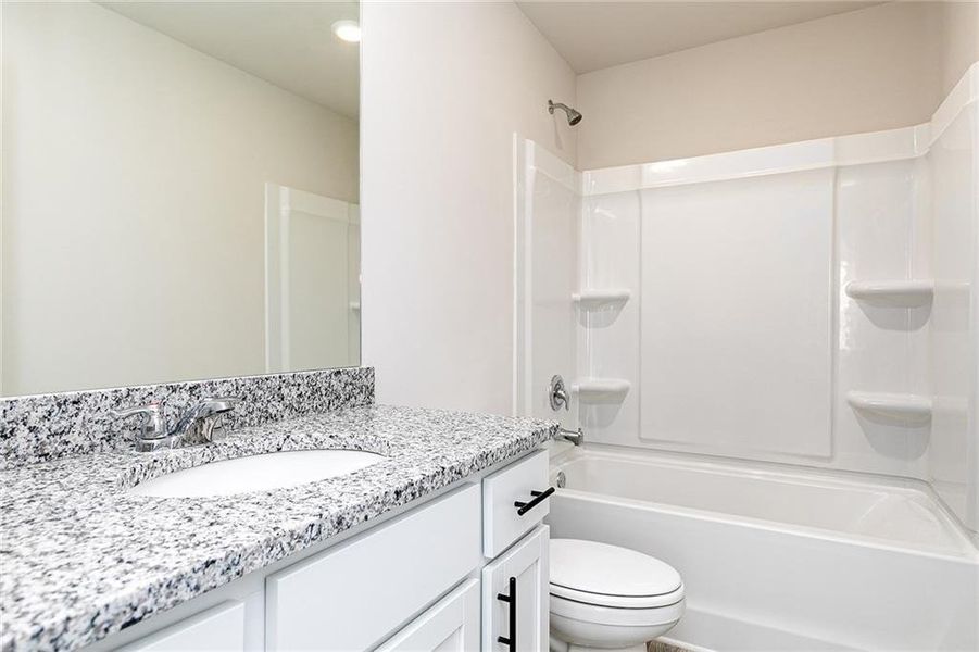 Furnished interior view inside a new home in Conners Landing at Mirror Lake, Villa Rica (Image 13).