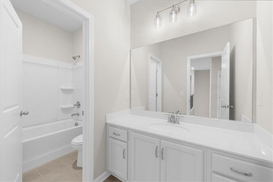 Furnished interior view inside a new home in River Rock, Ball Ground (Image 36).