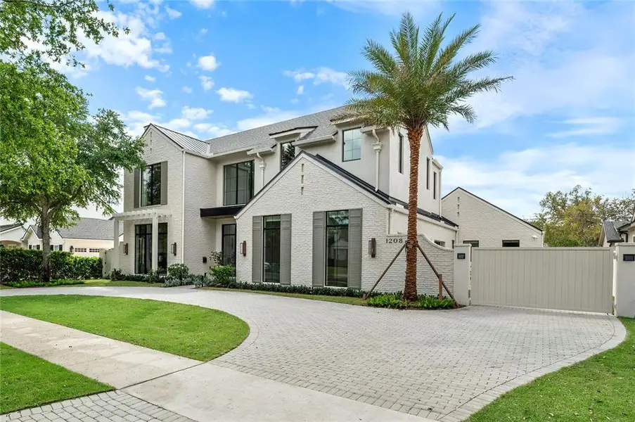 Front exterior of a new home in , Orlando, FL, highlighting curb appeal (Image 24).
