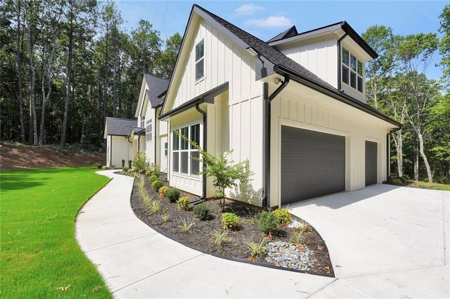 Front exterior of a new home in , Winston, GA, highlighting curb appeal (Image 21).