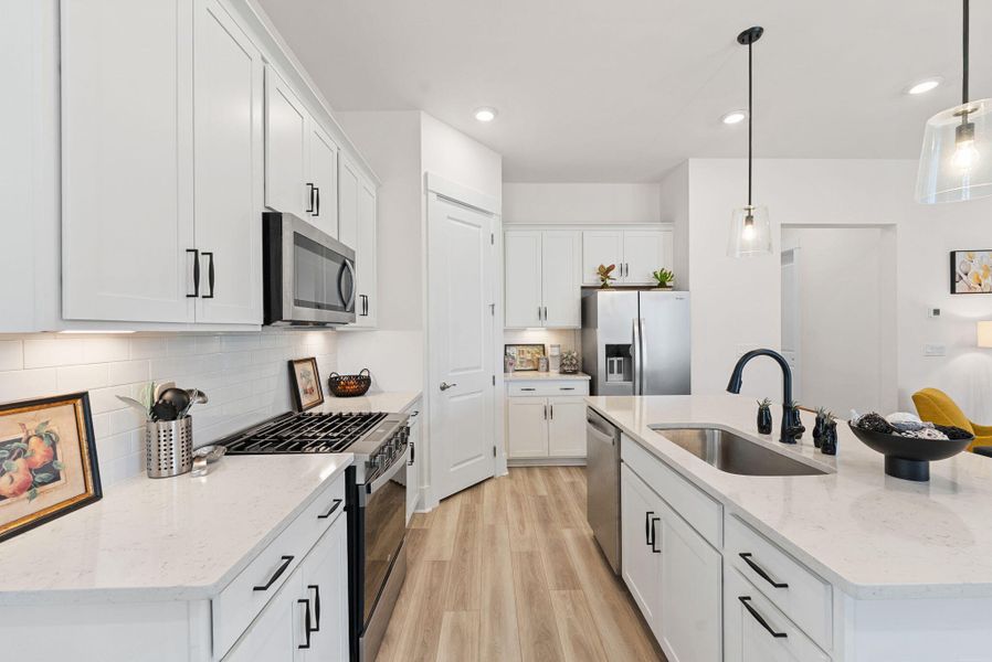 Furnished interior view inside a new home in Summerwind Crossing at Lakes of Cane Bay, Summerville (Image 7).