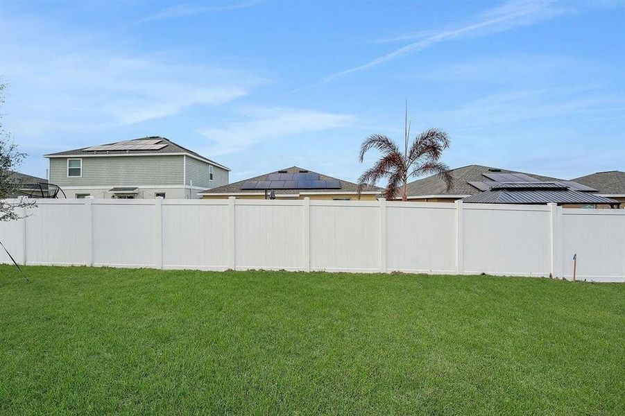 Exterior details and patio area of a home in Cypress Park Estates, Haines City (Image 23).