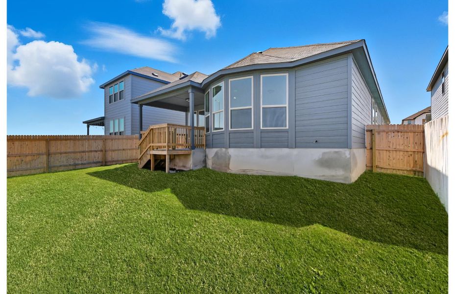 Exterior details and patio area of a home in Lily Springs, Seguin (Image 3). Exterior details and patio area of a home in Lily Springs, Seguin (Image 3).