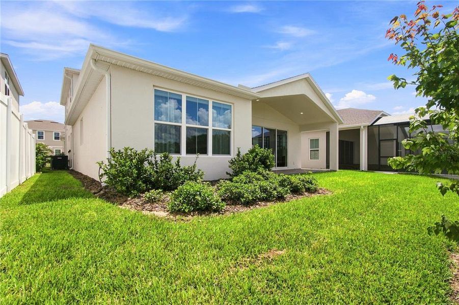 Exterior details and patio area of a home in Horizon Isle, Winter Garden (Image 3). Exterior details and patio area of a home in Horizon Isle, Winter Garden (Image 3).