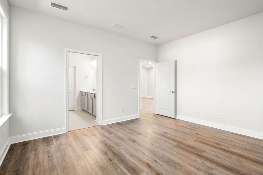 Spacious, unfurnished interior of a new home in Sun City Hilton Head, Bluffton (Image 18).