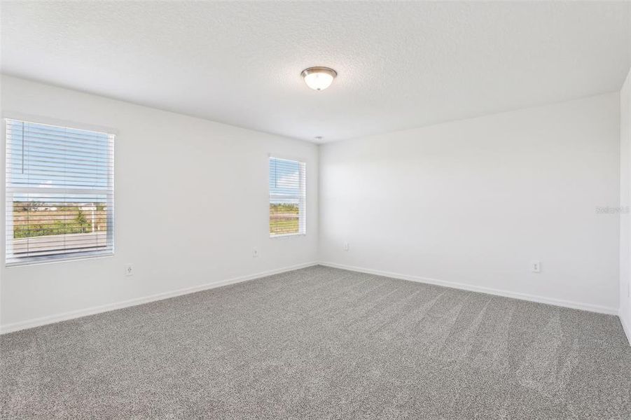 Spacious, unfurnished interior of a new home in Lake Deer Estates - Signature Series, Poinciana (Image 18). Spacious, unfurnished interior of a new home in Lake Deer Estates - Signature Series, Poinciana (Image 18).