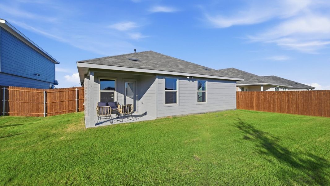 Exterior details and patio area of a home in Hickory Grove, Krum (Image 3). Exterior details and patio area of a home in Hickory Grove, Krum (Image 3).