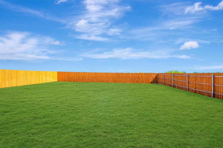 Exterior details and patio area of a home in Carillon, Manor (Image 17).