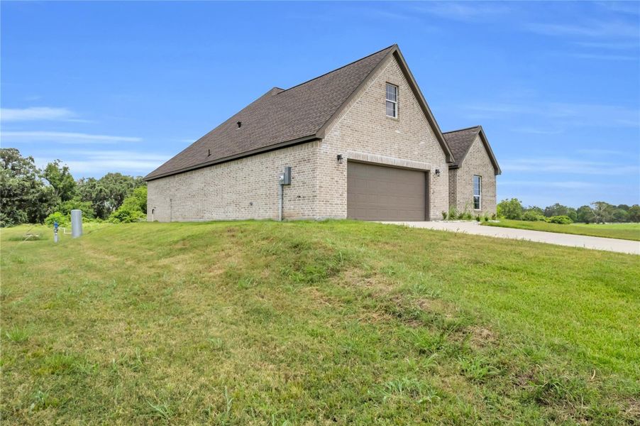 Front exterior of a new home in , Angleton, TX, highlighting curb appeal (Image 1). Front exterior of a new home in , Angleton, TX, highlighting curb appeal (Image 1).