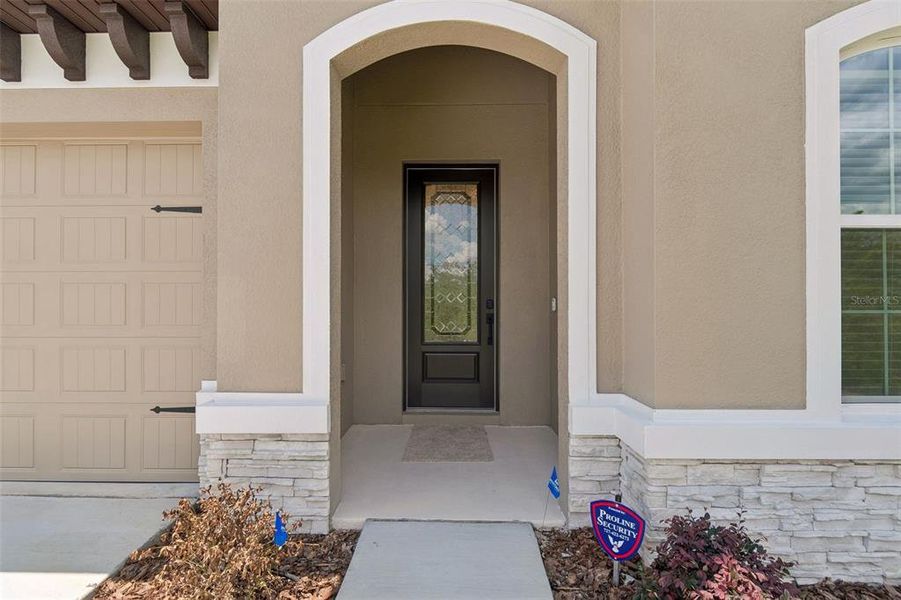 Exterior details and patio area of a home in Royal Highlands, Spring Hill (Image 3).