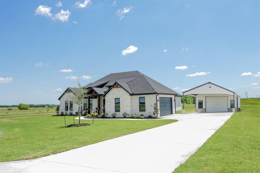 Front exterior of a new home in , Celeste, TX, highlighting curb appeal (Image 26).