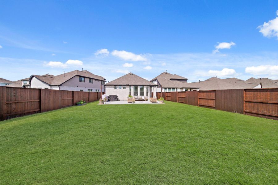 Front exterior of a new home in , Rosharon, TX, highlighting curb appeal (Image 1).