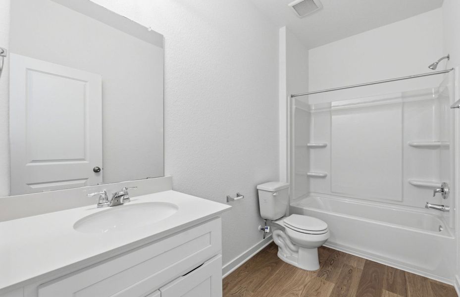 Furnished interior view inside a new home in Crosswinds, Kyle (Image 10).