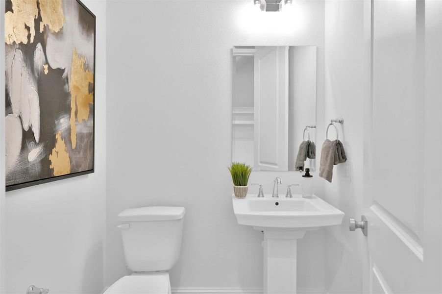 Wonderful powder bath downstairs is super convenient to main living areas. Wonderful powder bath downstairs is super convenient to main living areas.