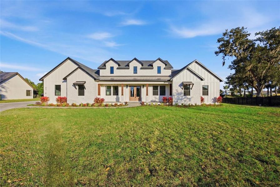 Front exterior of a new home in , Plant City, FL, highlighting curb appeal (Image 30).