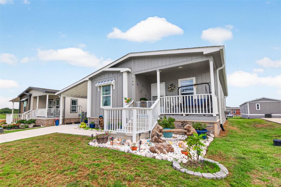 Exterior details and patio area of a home in , Willis (Image 24).