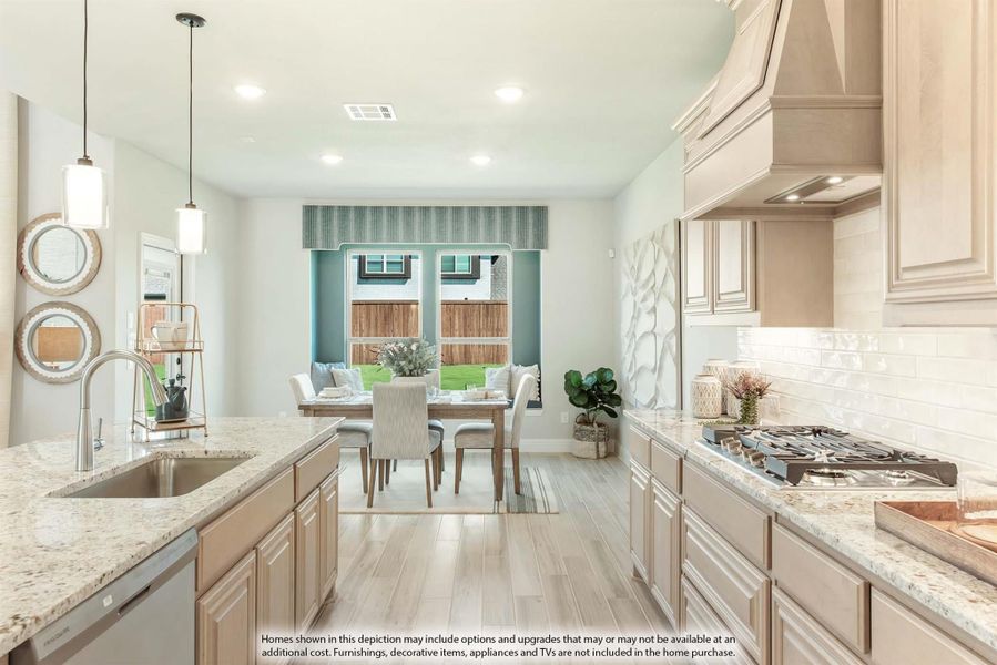 Kitchen with cream cabinets, granite countertops, gas cooktop, and pendant lights opening to a dining area with large windows. Kitchen with cream cabinets, granite countertops, gas cooktop, and pendant lights opening to a dining area with large windows.