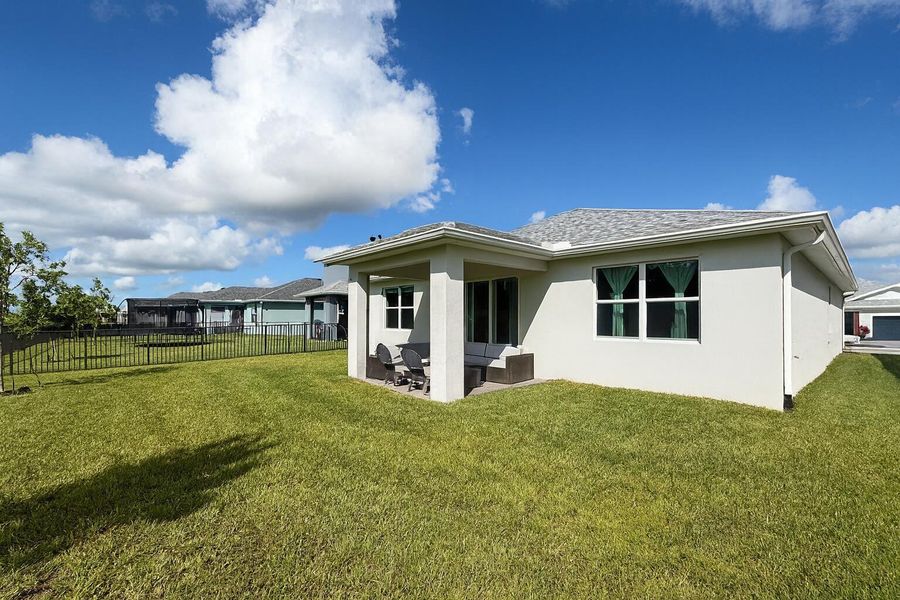 Exterior details and patio area of a home in Tradition - Cadence, Port St. Lucie (Image 3).