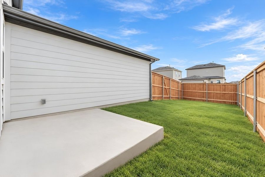 Exterior details and patio area of a home in Emory Crossing, Hutto (Image 3). Exterior details and patio area of a home in Emory Crossing, Hutto (Image 3).