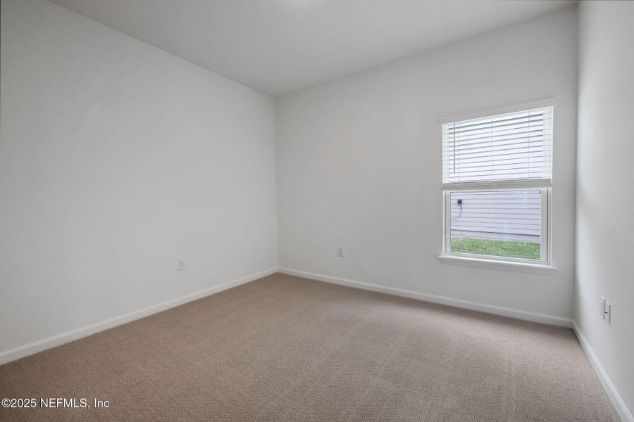 Spacious, unfurnished interior of a new home in Brook Forest, St. Augustine (Image 31).