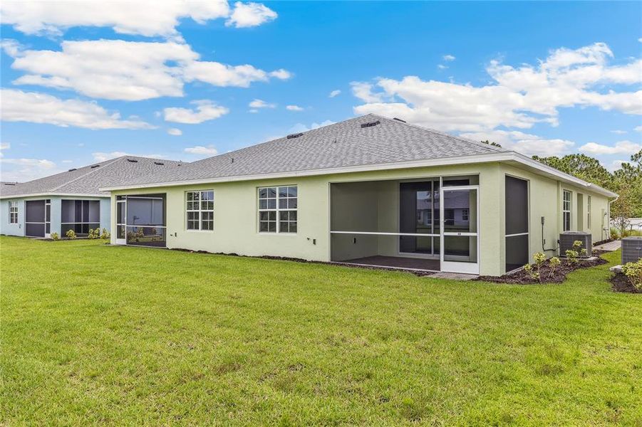 Exterior details and patio area of a home in Heritage Lake Park, Punta Gorda (Image 2).