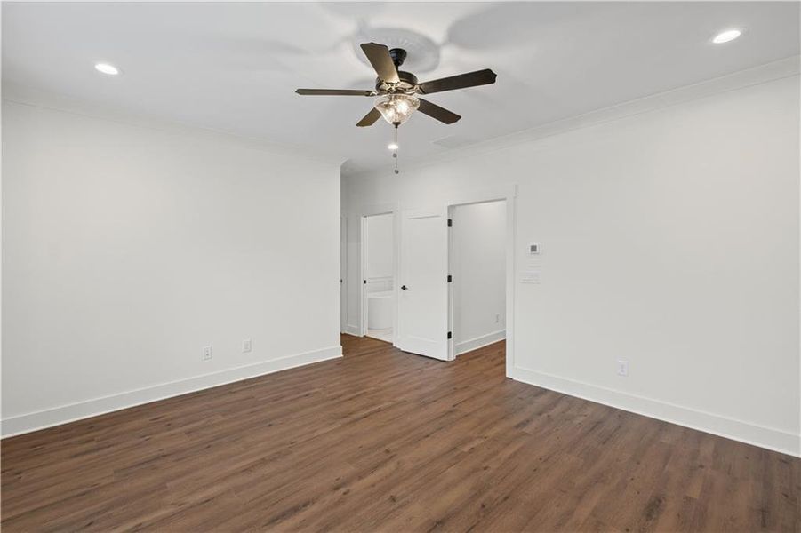 Spacious, unfurnished interior of a new home in Devin's Shire - A Kennesaw Tradition, Kennesaw (Image 31).
