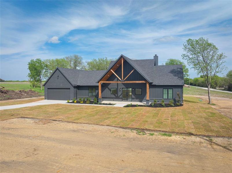 Front exterior of a new home in , Celeste, TX, highlighting curb appeal (Image 20).