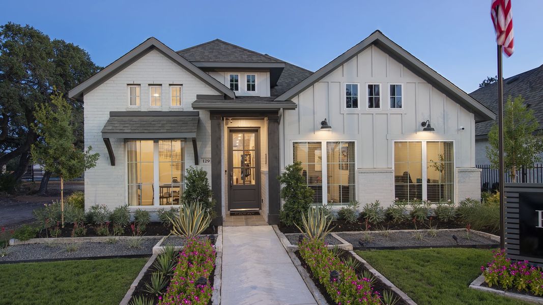 Front exterior of a new home in Briggs Ranch, San Antonio, TX, highlighting curb appeal (Image 24).