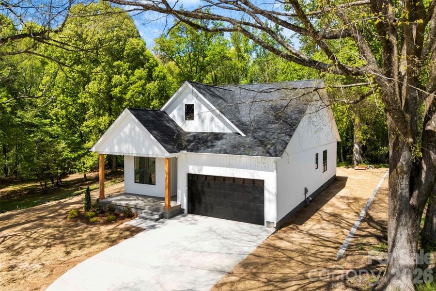 Front exterior of a new home in , Landis, NC, highlighting curb appeal (Image 23).