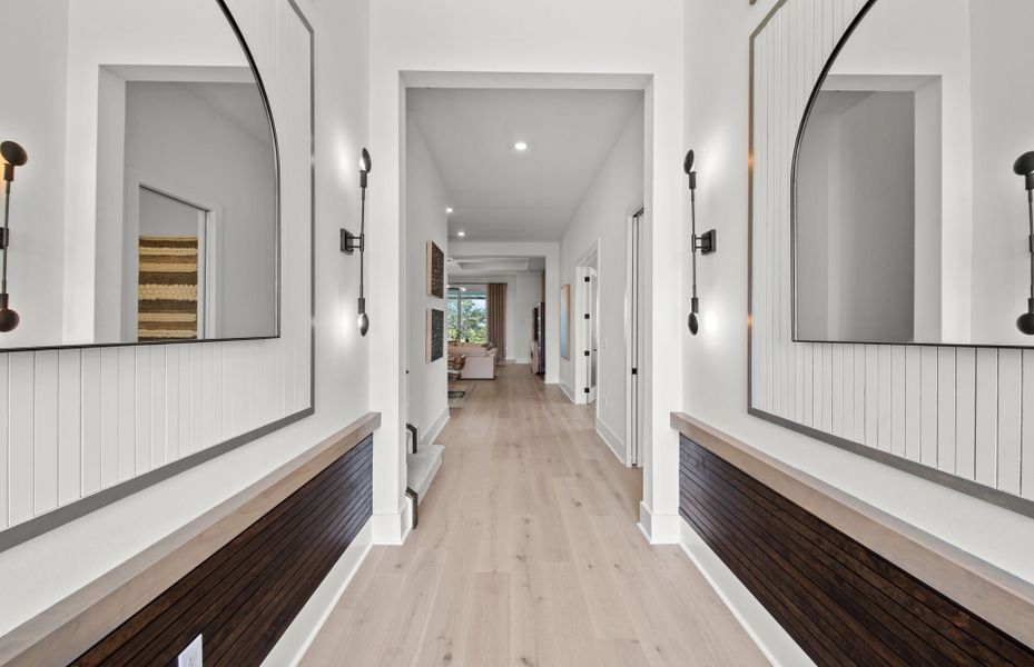 Representative furnished interior of a home built from the Layton Grande by DiVosta in BeachWalk by Manasota Key, Englewood (Image 26).