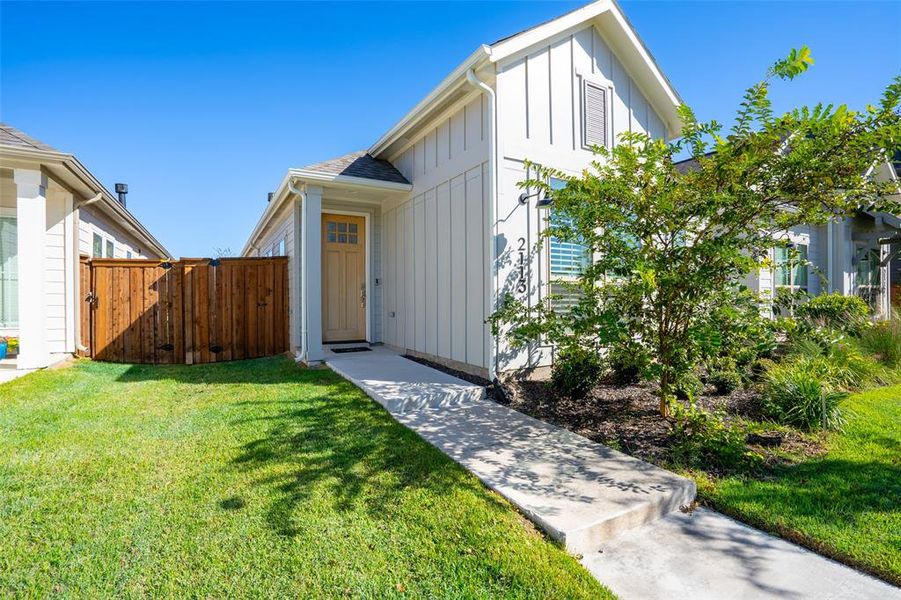 Exterior details and patio area of a home in Walsh Townhomes, Aledo (Image 16).