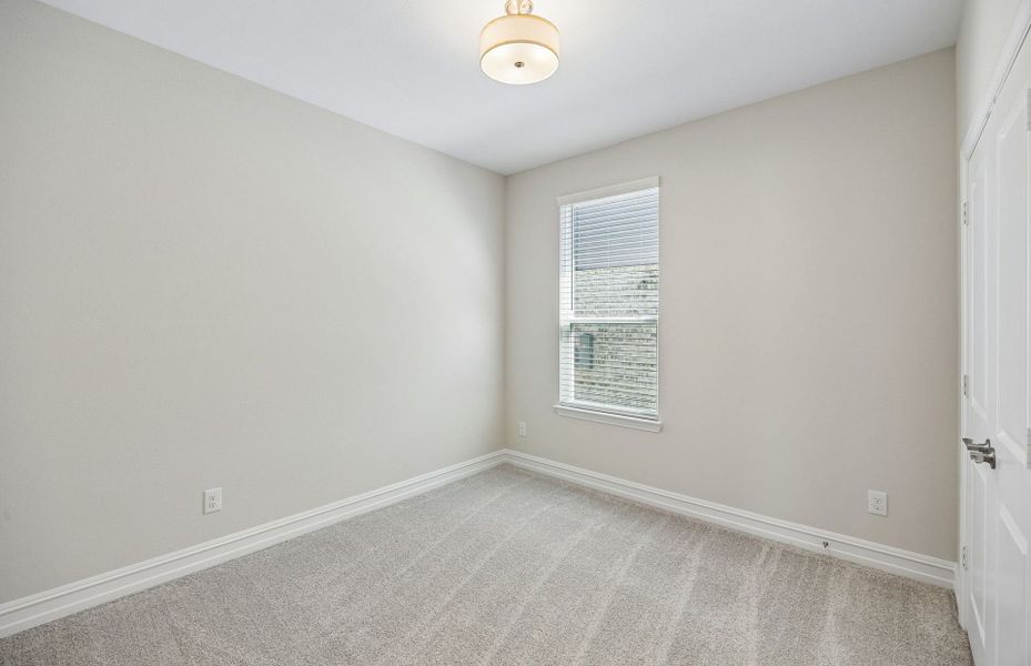 Spacious, unfurnished interior of a new home in Rosemary Fields, Godley (Image 13).