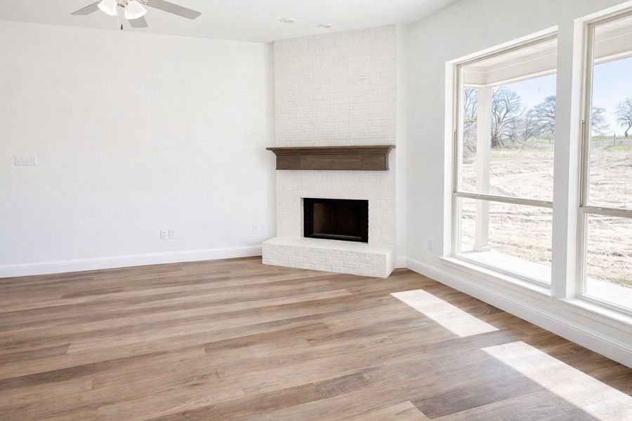 Living Room with Brick Fireplace to Ceiling and Custom Mantle Living Room with Brick Fireplace to Ceiling and Custom Mantle