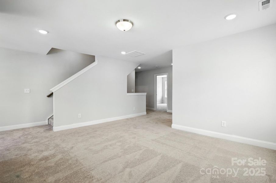 Spacious, unfurnished interior of a new home in Hampton Woods, Charlotte (Image 34).