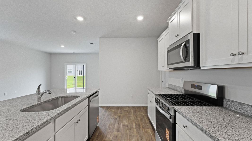 Furnished interior view inside a new home in Pine Hills at Cane Bay, Summerville (Image 5). Furnished interior view inside a new home in Pine Hills at Cane Bay, Summerville (Image 5).