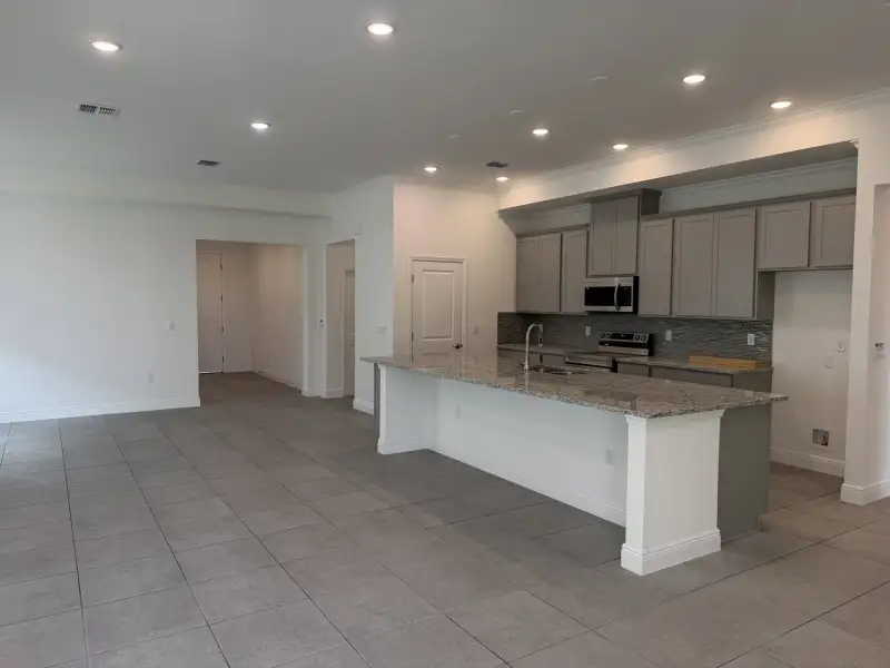 Furnished interior view inside a new home in Malabar Springs, Palm Bay (Image 4).