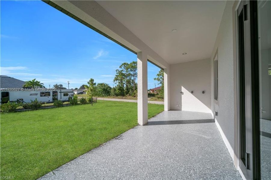 Exterior details and patio area of a home in , Lehigh Acres (Image 4). Exterior details and patio area of a home in , Lehigh Acres (Image 4).
