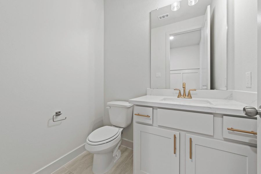 Furnished interior view inside a new home in Bridgeland, Cypress (Image 12).