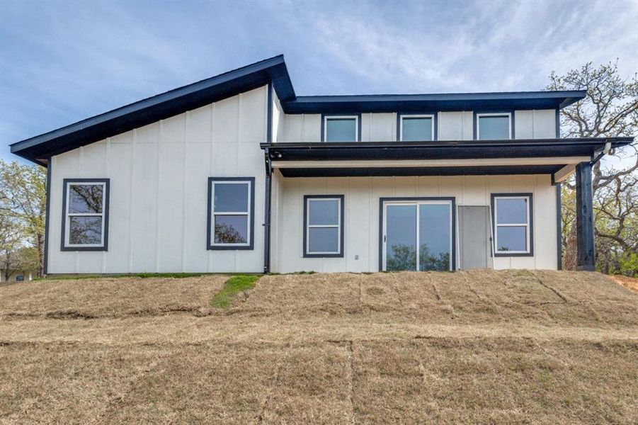 Front exterior of a new home in , Runaway Bay, TX, highlighting curb appeal (Image 2).