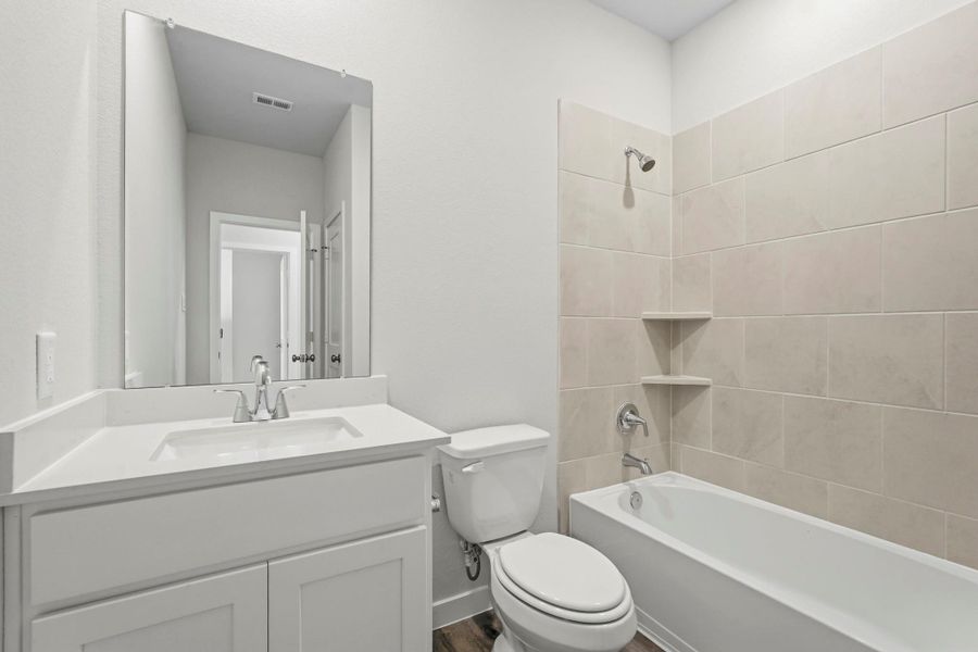 Furnished interior view inside a new home in Northpark South, Porter (Image 7).