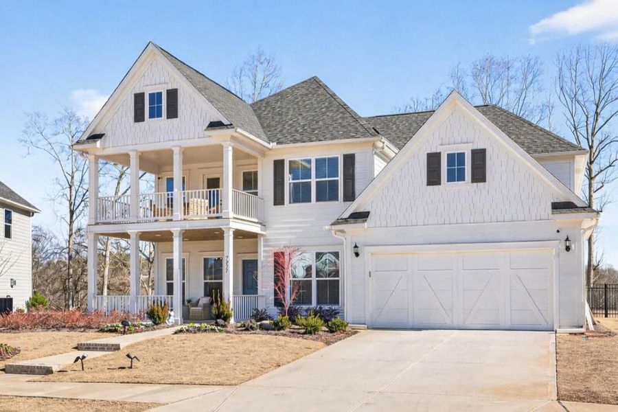 Front exterior of a new home in Reunion, Flowery Branch, GA, highlighting curb appeal (Image 26).