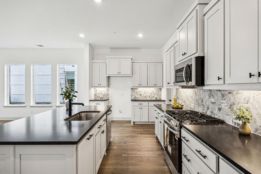 No shortage of style, prep or storage space in this over the top dream kitchen! No shortage of style, prep or storage space in this over the top dream kitchen!