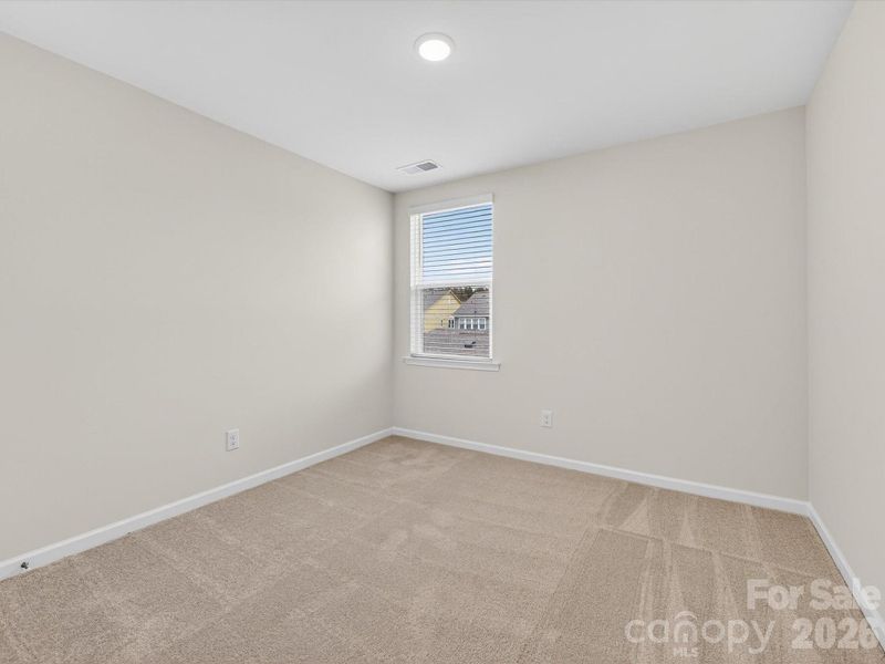 Spacious, unfurnished interior of a new home in North Creek Village, Huntersville (Image 27).