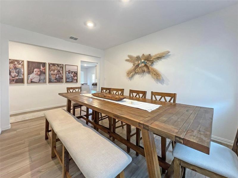 Dining space featuring light wood-type flooring