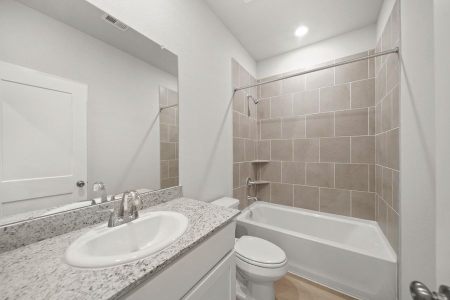 Furnished interior view inside a new home in Lexington Heights, Willis (Image 6). Furnished interior view inside a new home in Lexington Heights, Willis (Image 6).