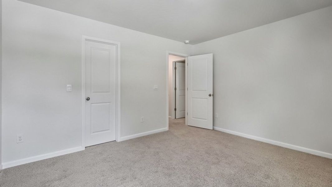 Spacious, unfurnished interior of a new home in The Estates at Edinborough, Gibsonville (Image 34).