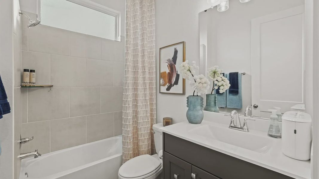 Representative furnished interior of a home built from the Medina by Chesmar Homes in Elyson 50's, Katy (Image 6).